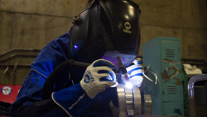 Jessica Johnston TIG welding at Axis Fabrication