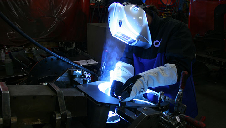 closeup of welder MIG welding