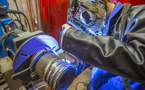 Team Fabricators employee pipe welding 