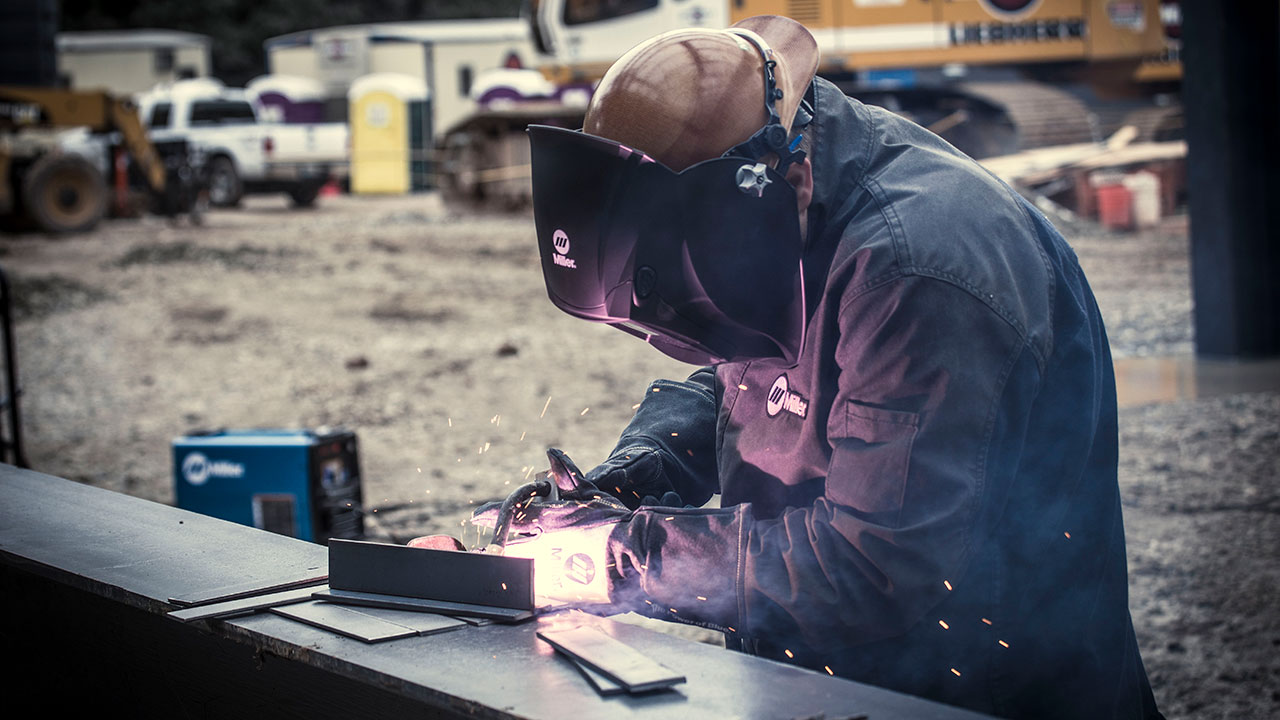 Welding with a Miller wire feeder on a jobsite