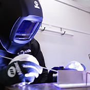 Close-up image of an operator TIG welding