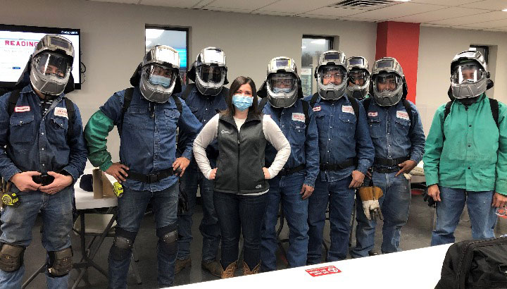 Group of welding operators wearing Powered Air Purifying Respirator
