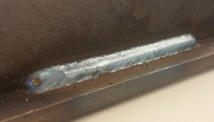 A finished horizontal tee joint weld completed using C25 shielding gas.