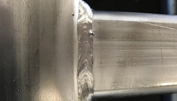 Closeup of a stainless steel MIG weld