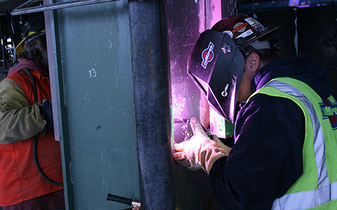 Welder welding using ArcReach technology by Miller Electric Mfg. Co. 