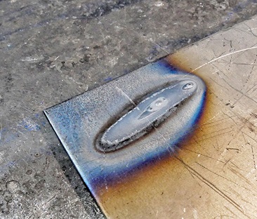 Close up of weld with burn-through