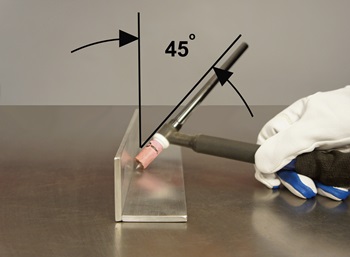 Welder and graphic demonstrating a 45-degree angle for a fillet weld