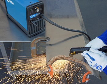 Plasma cutting a piece of stainless steel