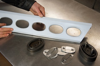 Oval holes being punched