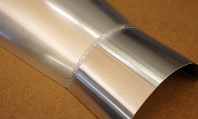 Close-up of aluminum weld creating using 75% EN