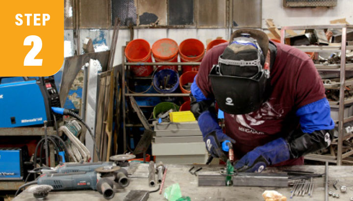 step 2: a welder wearing gloves and mask mig welding