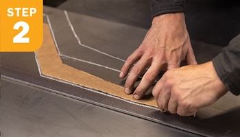 tracing template onto metal with chalk