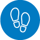 White illustration of shoe footprints inside of a blue circle