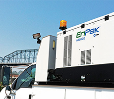 Image of a Miller EnPak on top of a work truck