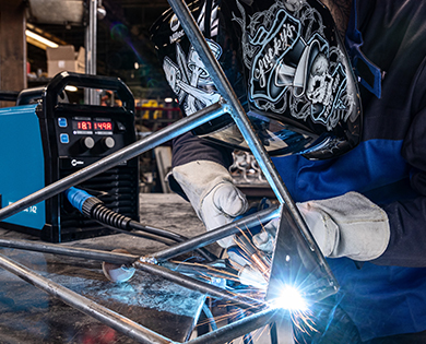 Welder flux-core welding metal tubing with the Millermatic 142 MIG welder for beginners.